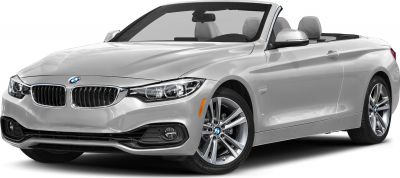Sleek silver convertible with open roof and modern alloy wheels