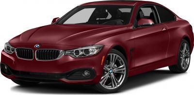 Front view of a red 4-door coupe with LED headlights and alloy wheels