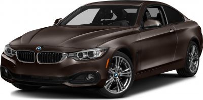Front angle of luxury coupe with kidney grille and alloy wheels