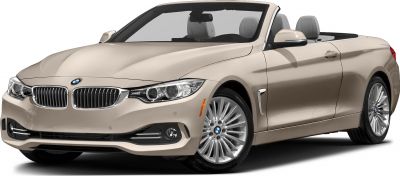 Convertible car front with sleek headlights and alloy wheels