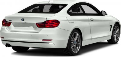 White coupe rear view with distinct taillights and sporty rear design