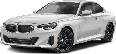 White luxury coupe with black alloy wheels and LED headlights