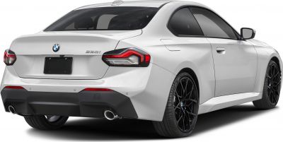 Rear view, distinctive tail lights, dual exhaust, black wheels