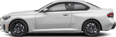 Side profile of a sleek two-door coupe with alloy wheels and sculpted body lines.