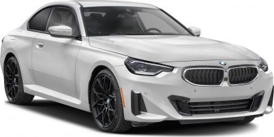 Sleek coupe front with LED headlights and black alloy wheels.