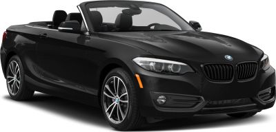 Front angled view of black convertible with alloy wheels and LED headlights