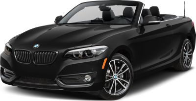 Front angle view of a black convertible with LED headlights and alloy wheels