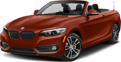 Front view of red BMW convertible with open roof and alloy wheels