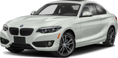 White coupe with twin circular headlights and kidney grille.
