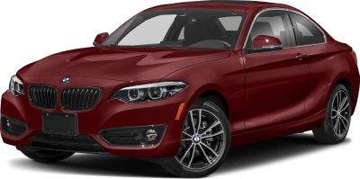Front angle view with headlights and alloy wheels