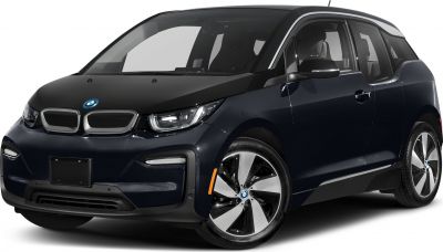 Front view of car with distinctive headlights and alloy wheels