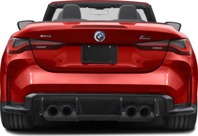 Quad exhaust tips and sleek tail lights on sporty rear convertible