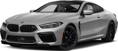 Aggressive front grille and black alloy wheels on a sporty coupe