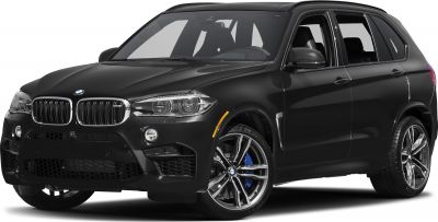Front view of black BMW X5 M F85 with prominent grille and alloy wheels