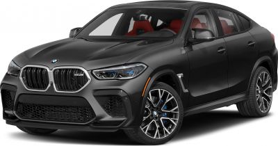 Front-side view of luxury SUV with aggressive grille and red seats