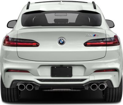 Rear view with quad exhaust and sleek taillights