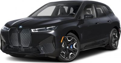 Front-side view showcasing large kidney grille and sleek LED headlights.