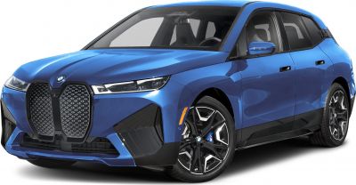 Large distinctive front grille and intricate alloy wheels on modern electric SUV