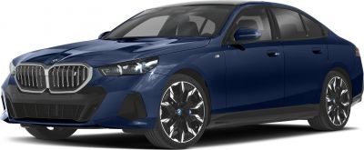 Front grille and alloy wheels of an electric sedan