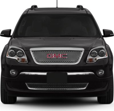 Front view with signature grille, dual headlights, and fog lights