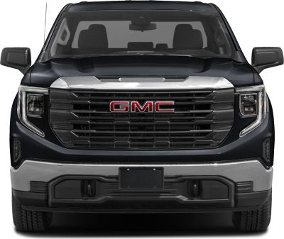 Front view of truck with bold grille and headlights
