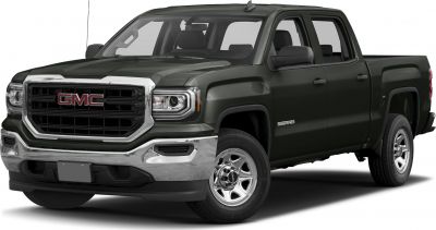Pickup truck front-side view with chrome bumper and bold grille