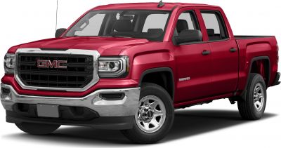 Red 2016 pickup with prominent grille and rugged design front side view