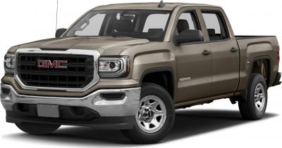 Front view of pickup truck with bold grille and rectangular headlights