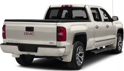 Rear-side view of extended cargo bed pickup with dual doors