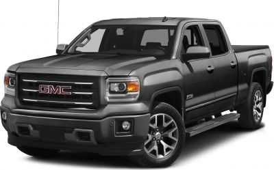 Front three-quarter view of a pickup truck with distinctive grille and headlights