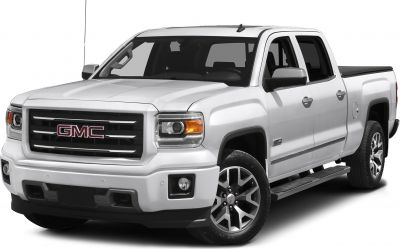 Front angle of a pickup truck with grille, headlights, wheels, and side step