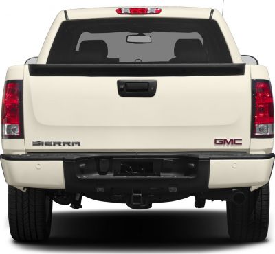 Rear view of a pickup tailgate with bumper and distinctive taillights