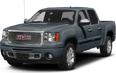 Double cab pickup with chrome grille, alloy wheels, and side view.