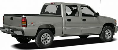 Side view of 4x4 crew cab pickup with extended bed and cabin