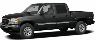 Black crew cab 4x4 pickup truck side view