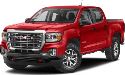 Front view of extended cab pickup with bold grille and off-road AT4 trim