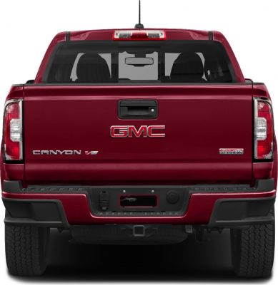 Red pickup truck tailgate with GMC, Canyon V6, All Terrain badges
