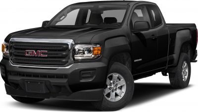 Front view of extended cab long box pickup with prominent grille and headlights