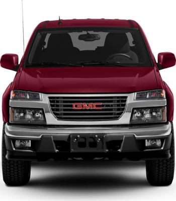 Front view of a pickup truck with distinct grille and headlights