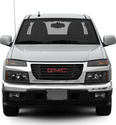 Front view of pickup truck with grille, headlights, and bumper