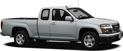 Side profile of silver extended cab pickup truck with alloy wheels