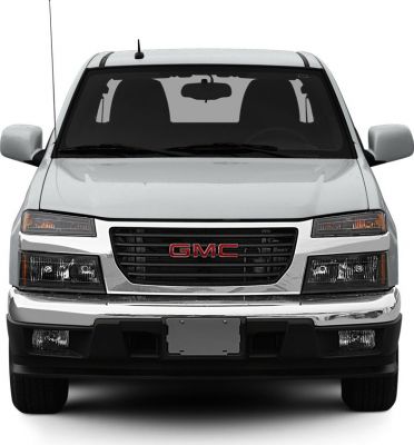 Front view showing grille, headlights, and bumper of extended cab pickup.