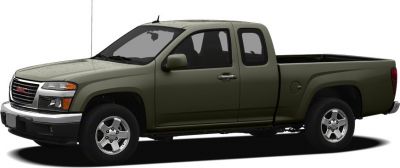 Extended cab pickup truck in olive green, side profile view