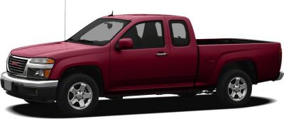 Side view of mid-size extended cab pickup truck with open cargo bed.