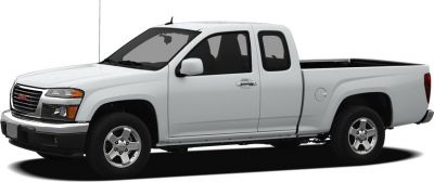 Side view of white extended cab pickup with alloy wheels