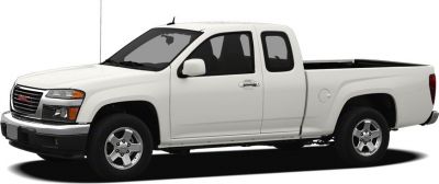 Side view of a white extended cab pickup truck with alloy wheels.