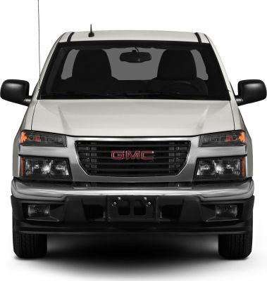 Front view featuring grille, headlights, bumper, and side mirrors
