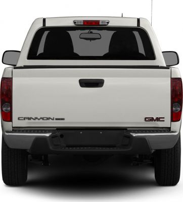 Rear view of a regular cab pickup with tailgate and dual rear lights.