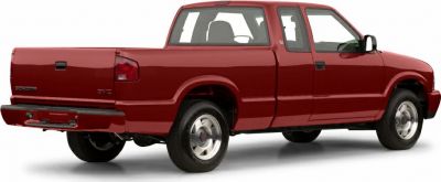 Rear side view of red extended cab pickup with double cab doors