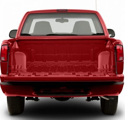 Open empty pickup truck bed with classic taillights and rear window